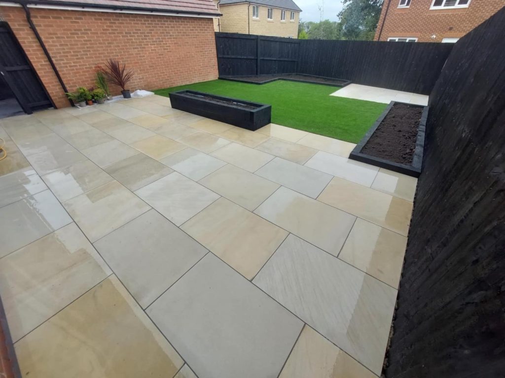 Polished Flags, Artificial Grass & Raised Borders - photo 1