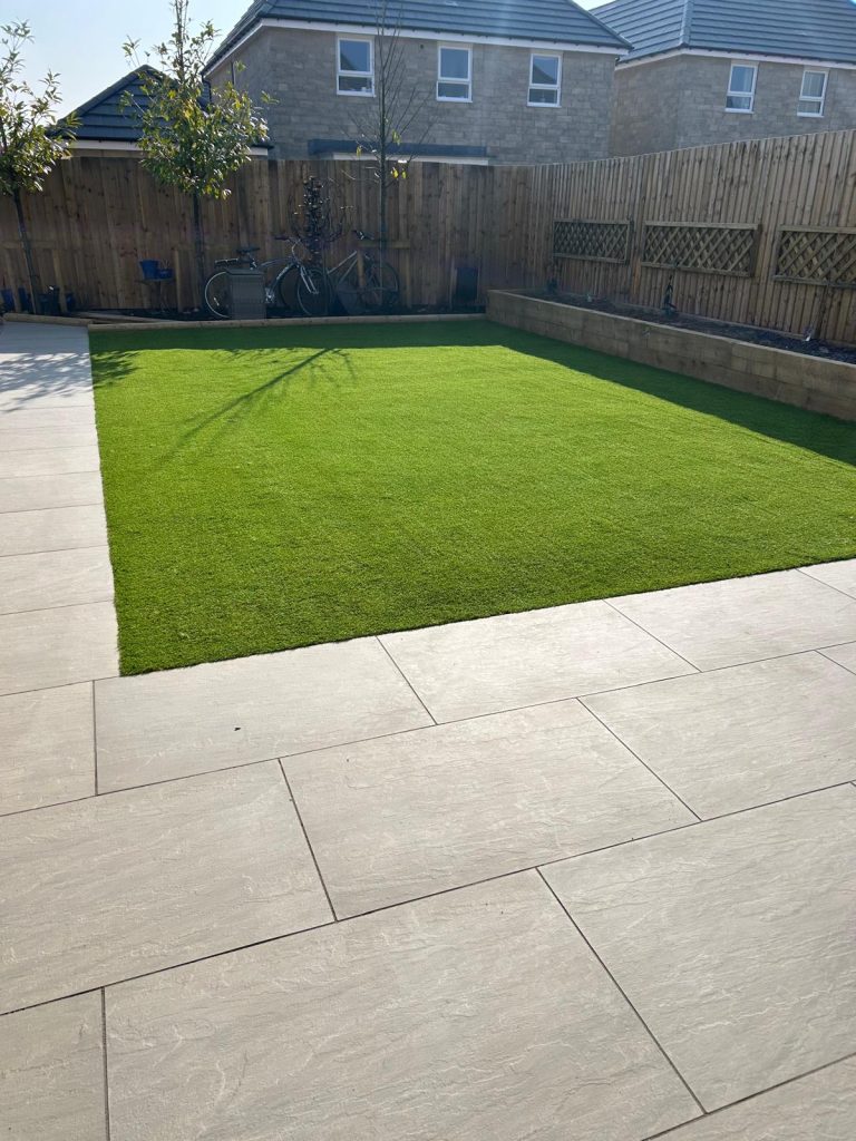 Porcelain Patio, Artificial Grass & Sleeper Borders - photo 1